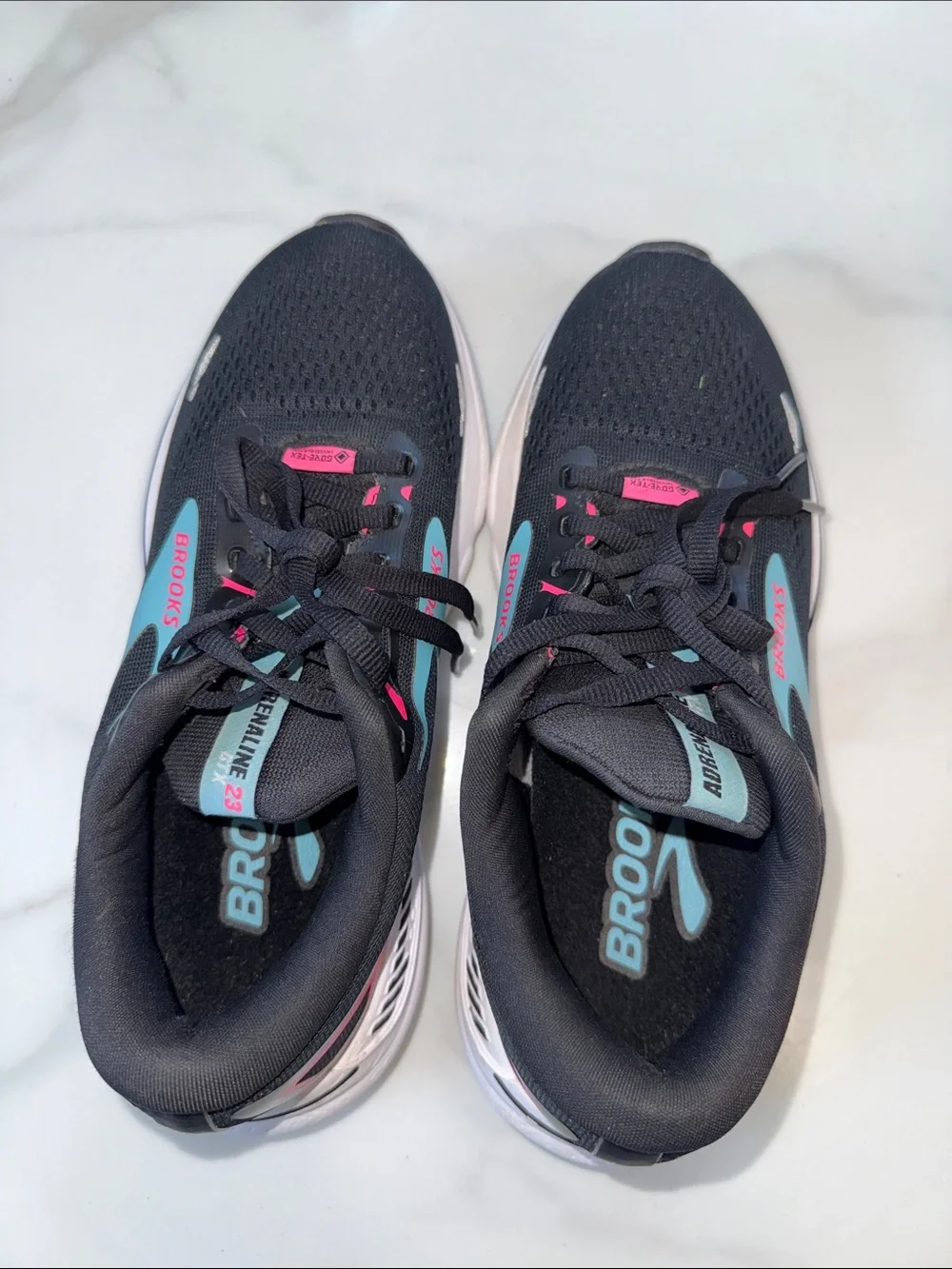 Brooks Women’s Black Running Shoes with Pink & Teal Accents